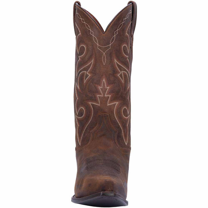 Dan Post Renegade Bay Apache cowboy boots: Distressed brown leather with a snip toe and contrasting stitching. Features intricate floral designs, a tall shaft, and a sturdy sole with a slight heel for stability.

