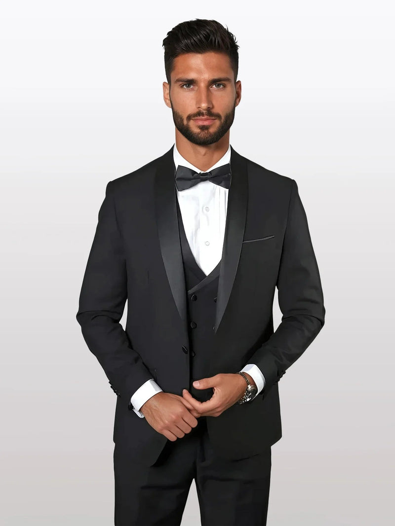 The men's black shawl lapel vested tuxedo is crafted from 100% wool, featuring a sleek, fitted silhouette with a three-button vest, shawl lapels, and a tailored jacket.