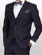 Slim fit vested suit in a deep eggplant color, featuring a single-breasted design with a two-button closure, flat pockets, and a notch lapel. The suit is complemented by a white dress shirt and a patterned bow tie.