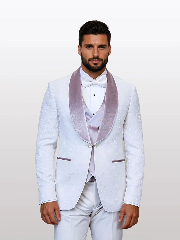 Men's ivory velvet shawl lapel tuxedo features a textured fabric with a floral pattern and a light violet velvet shawl lapel. It includes a matching velvet vest and contrasting black buttons.