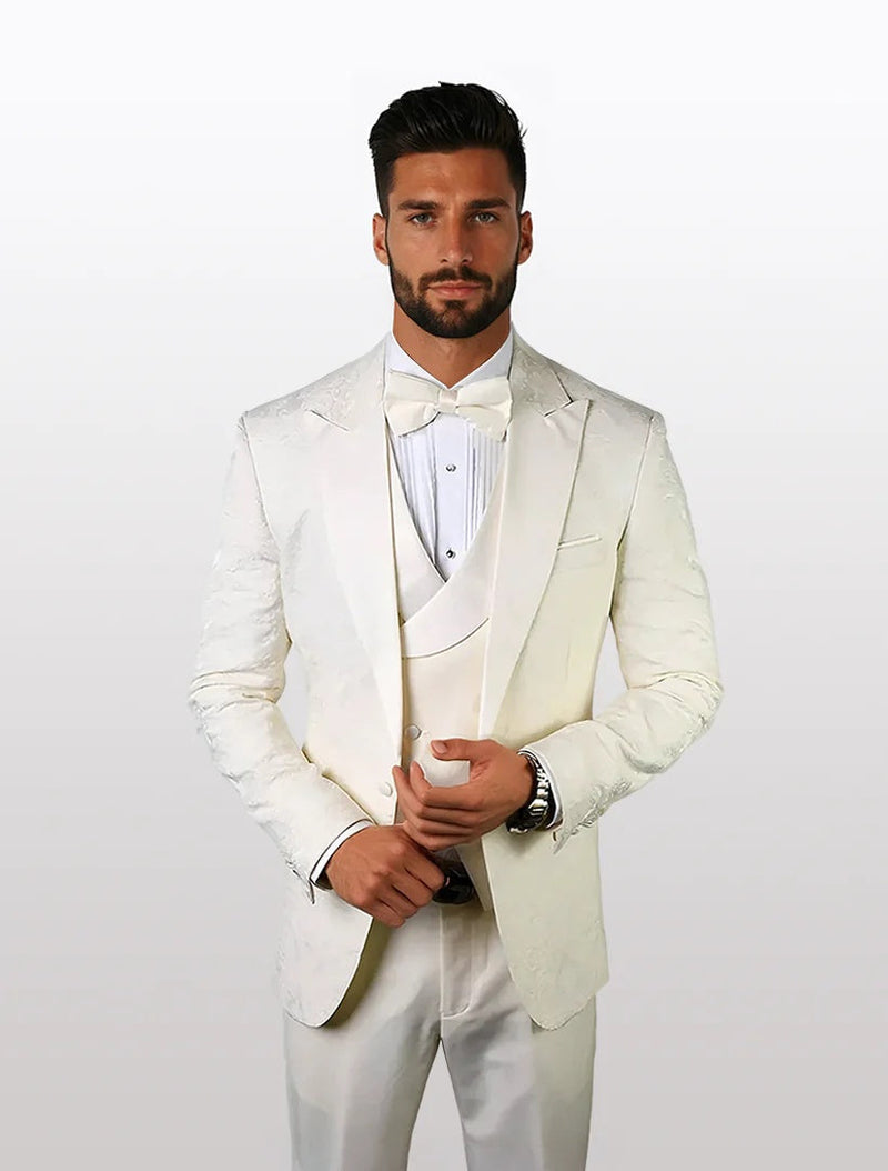 Men's off-white patterned vested tuxedo, featuring a structured blazer and a matching bowtie, with a subtly detailed texture throughout the fabric and an accompanying vest.
