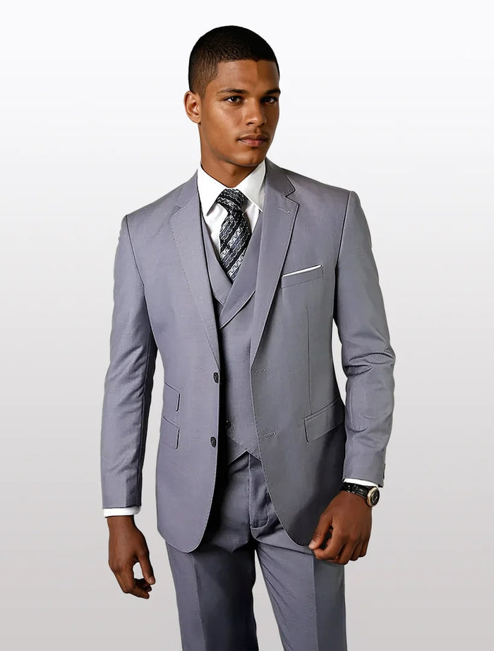 Men's grey modern fit vested suit by Alberto Nardoni features a tailored silhouette, made of 100% wool. The suit includes a matching vest and has subtle pocket details.