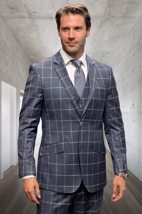 Men's grey wool windowpane suit. Designer two-button jacket, tailored fit with vest. Features a patterned check design, two front pockets, and chest pocket.
