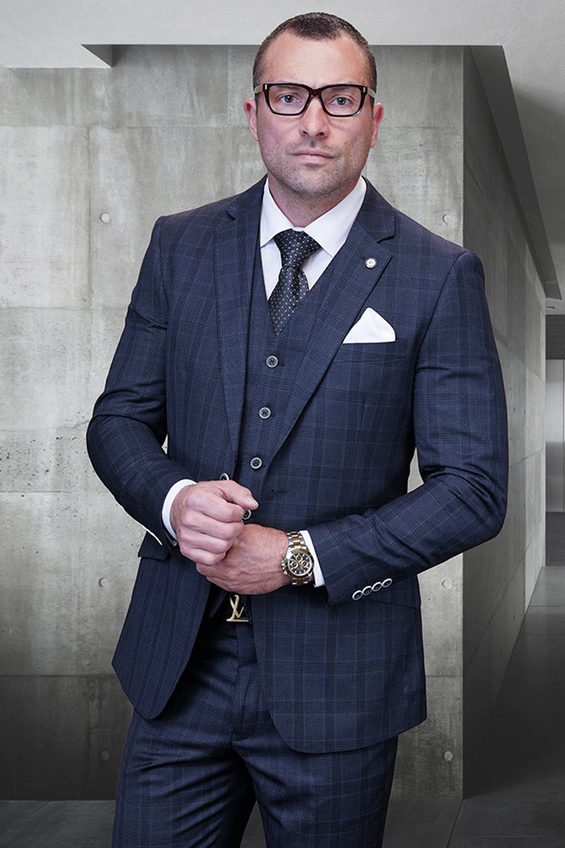 Men's modern fit charcoal grey wool suit with glen plaid. Includes fitted jacket, trousers, and vest for a tailored look. Textured fabric, notch lapels, and button details add sophistication.
