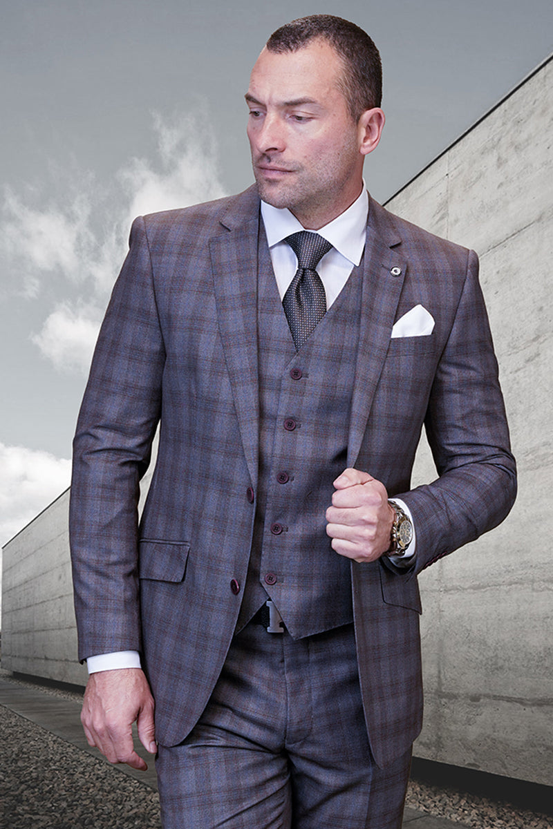 Modern fit men's wool suit with a taupe glen plaid. Features a tailored jacket, vest, and fitted trousers. Textured wool fabric with a blend of taupe hues.
