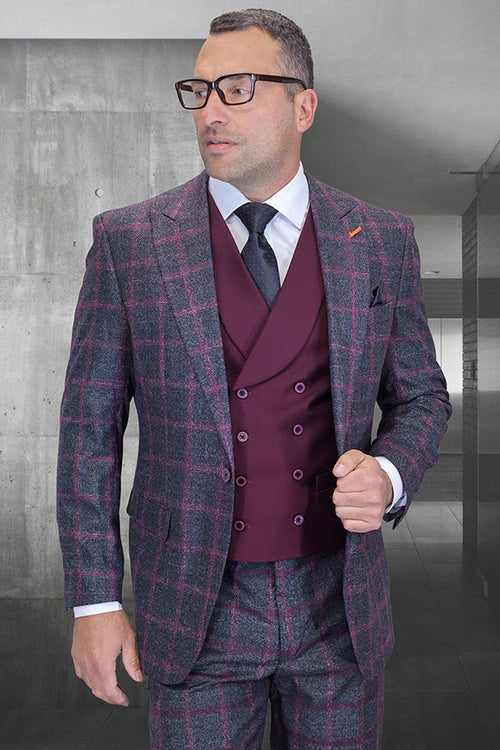 Dark gray wool suit with pink check. Features a one-button jacket with peak lapels, and a matching burgundy double-breasted vest. Tailored trousers in the same check pattern.
