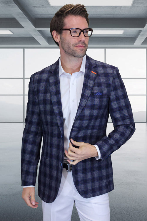 Men's grey plaid blazer. Modern fit, structured shape with a patch pocket. Wool blend, primarily grey with navy and lighter check patterns.
