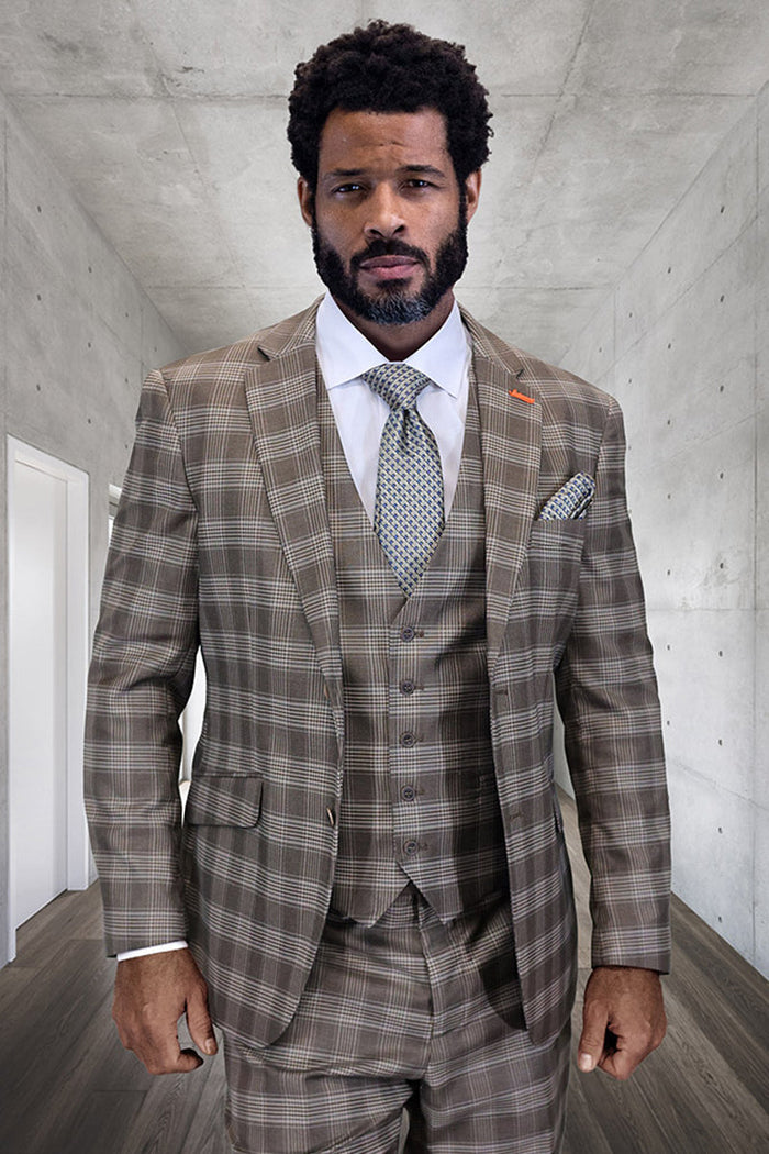 Men's chocolate brown plaid wool suit with a modern fit. Includes a tailored jacket, vest, white dress shirt, and patterned blue tie. Formal look and textured appearance.
