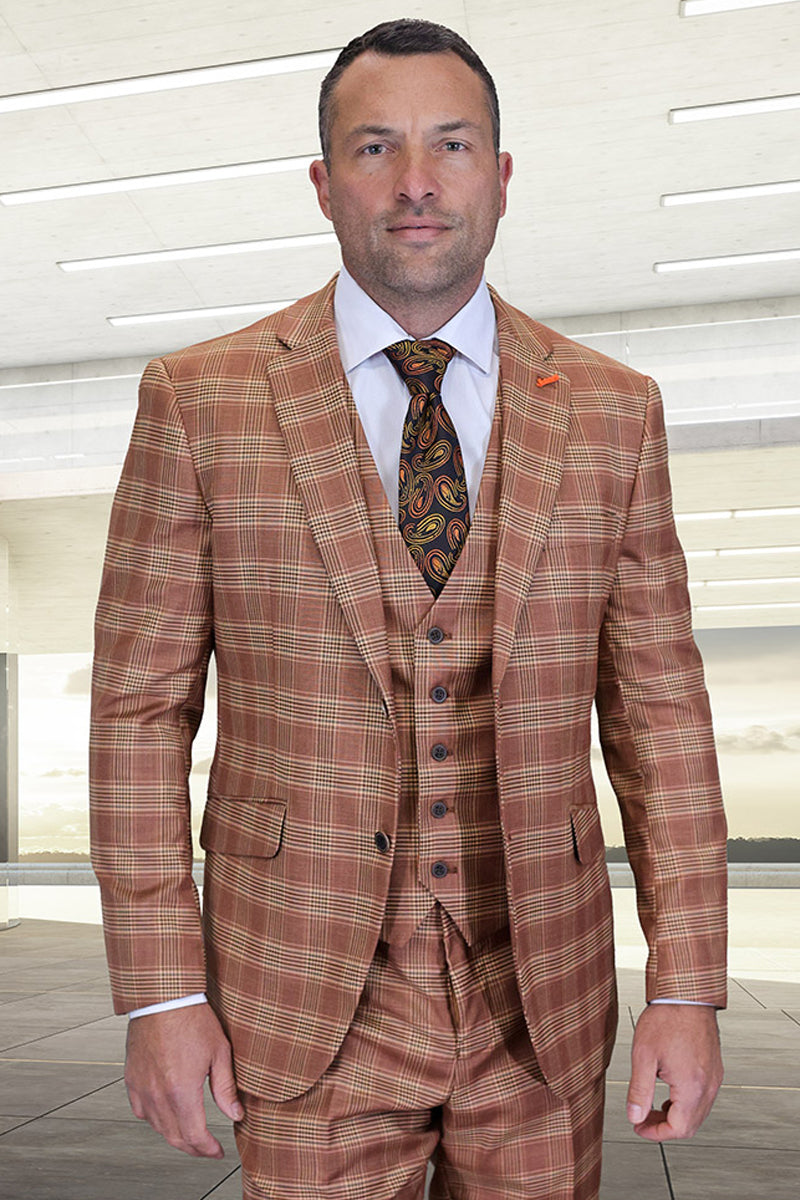 Men's rust glen plaid wool suit: modern fit, two-button. Includes blazer, vest & pants. Warm rust color with beige plaid. Tailored design, notch lapels, side pockets.
