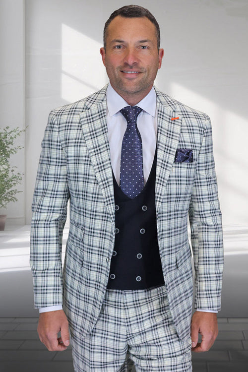 Men's tailored wool suit: grey-blue windowpane blazer, matching trousers, and a double-breasted scoop vest. Features structured shoulders, slim fit, and a classic checkered pattern. Sophisticated design.
