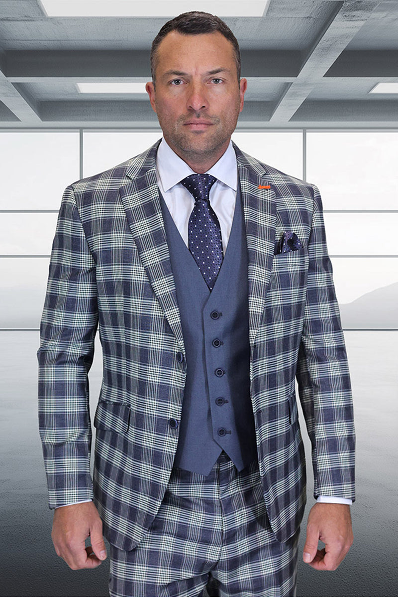 Men's modern fit grey plaid wool suit with a contrasting blue vest. Structured blazer, single-breasted with notch lapels, featuring a dark/light grey plaid pattern and white accents. Blue vest completes the design.
