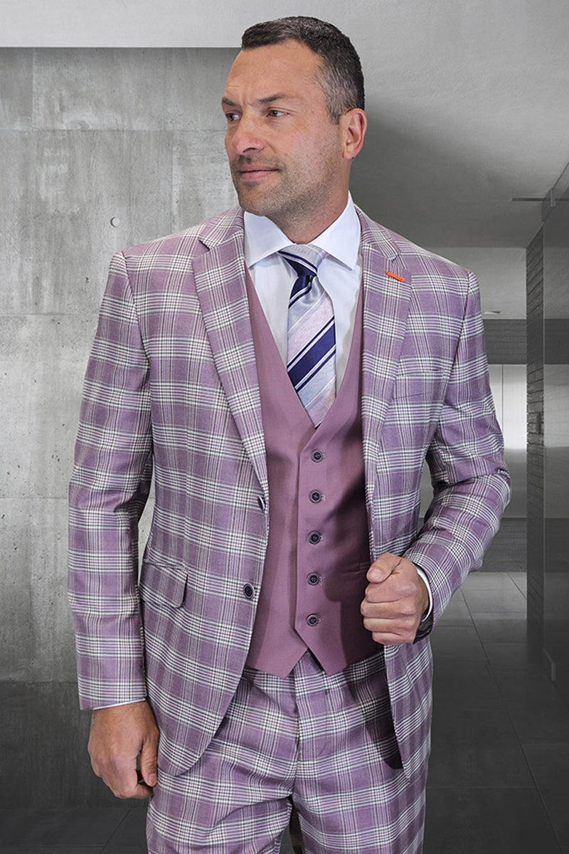 Men's modern fit wool suit in mauve pink and lavender plaid. Features contrasting mauve vest with multiple buttons. Blazer: notch lapels, side pockets. Plaid pattern: light/dark mauve & lavender. Matching plaid trousers.
