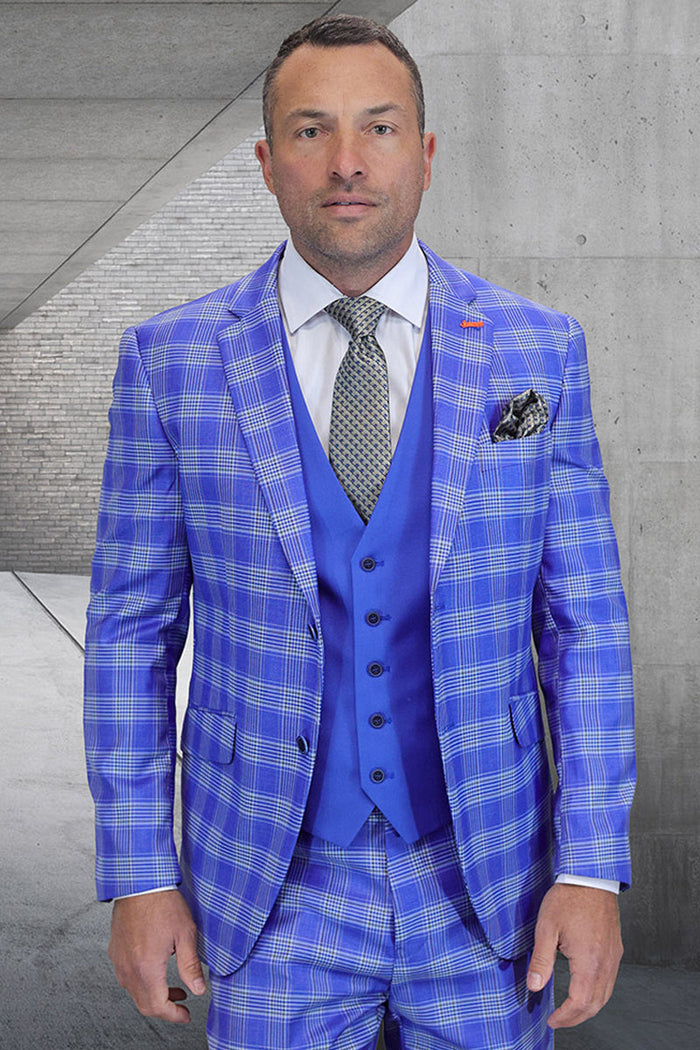Men's modern fit suit in French blue plaid. Features a contrasting blue vest, tailored jacket, and matching plaid trousers. Designer quality wool.
