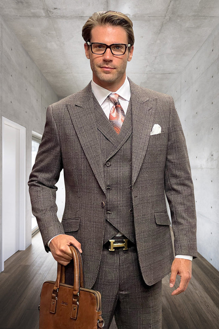 Men's designer wool suit. Peak lapel, muted brown, widowpane plaid. Fitted jacket and matching trousers. Classic, tailored style.
