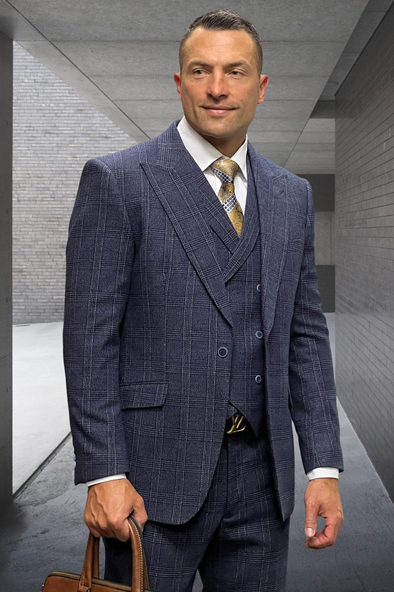 Navy wool suit with windowpane plaid. Double-breasted jacket, peak lapels. Matching trousers. Classic designer style.
