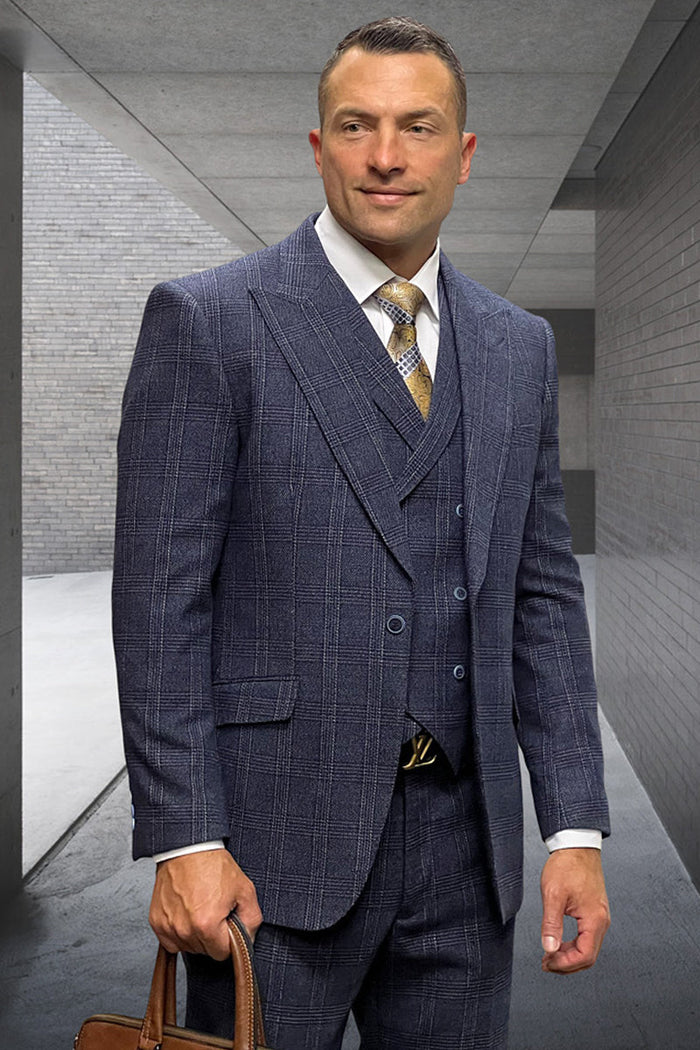 Navy wool suit with windowpane plaid. Double-breasted jacket, peak lapels. Matching trousers. Classic designer style.
