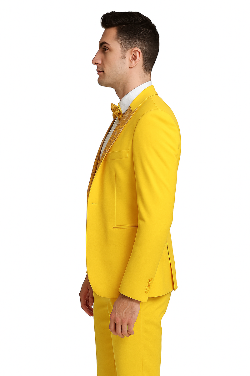 Golden yellow men's three-piece suit. Features a fitted cut, floral peak lapel, and matching bow tie. Jacket, trousers, and vibrant color.
