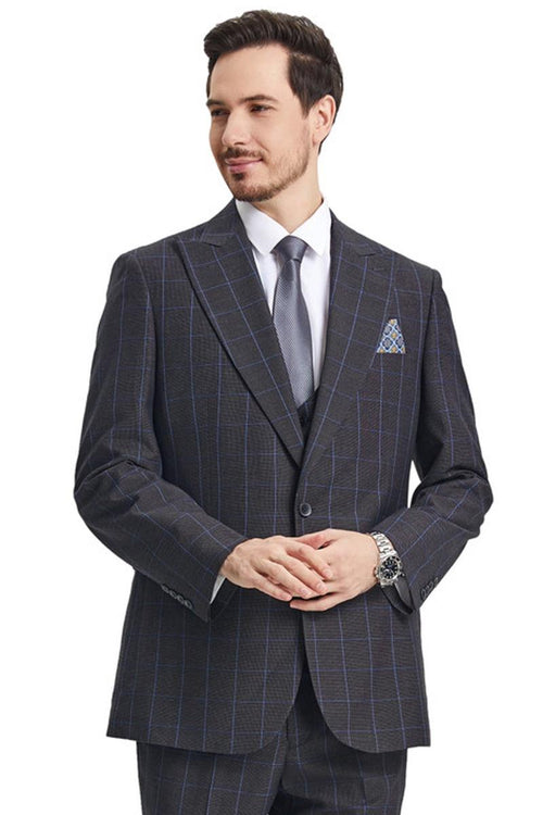The Stacy Adams men's peak lapel suit is charcoal grey with a windowpane plaid pattern featuring blue lines. The suit includes a scoop neck vest and is made from a smooth fabric.