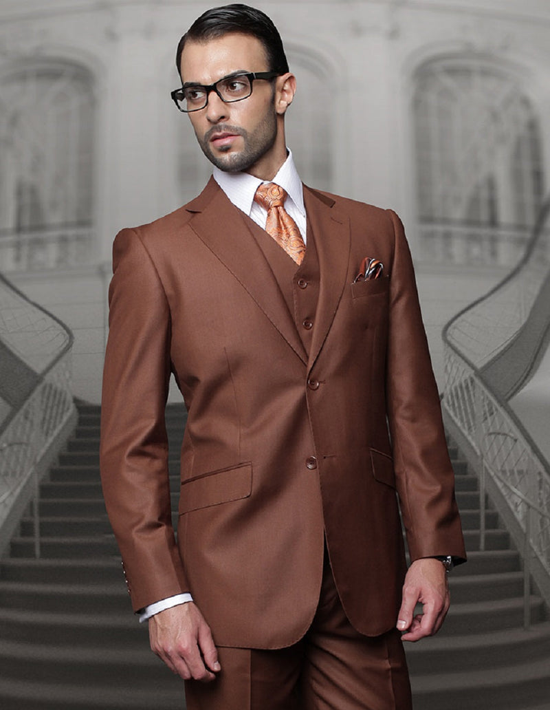 Classic fit men's pleated pants and a copper two-button wool suit are shown. The suit includes a fitted blazer with a notch lapel, side pockets, and a matching vest.
