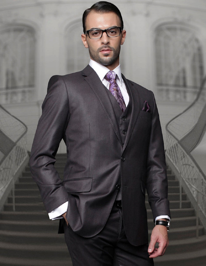 Men's charcoal grey wool suit with a classic fit. Features a 2-button blazer with notched lapel and pleated trousers. Structured silhouette with a smooth fabric texture.