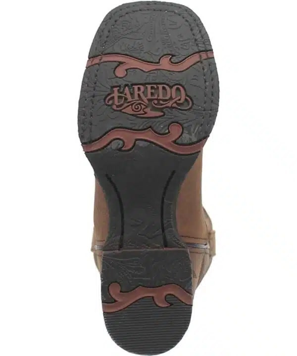 Laredo Sariah women's boot. Brown leather upper, pointed toe. Black rubber sole with intricate patterns & Laredo logo.
