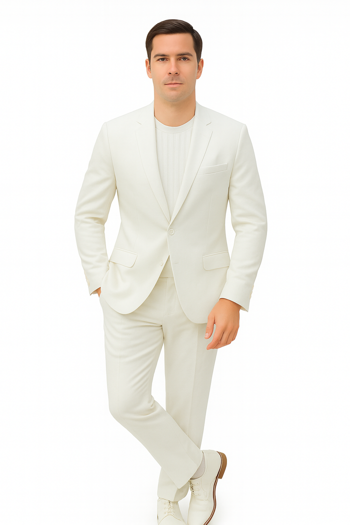 Men's white linen suit. Relaxed hybrid fit, no collar. Single-breasted jacket with two pockets. Straight-cut trousers. Smooth texture, simple design. Perfect for a casual summer look.
