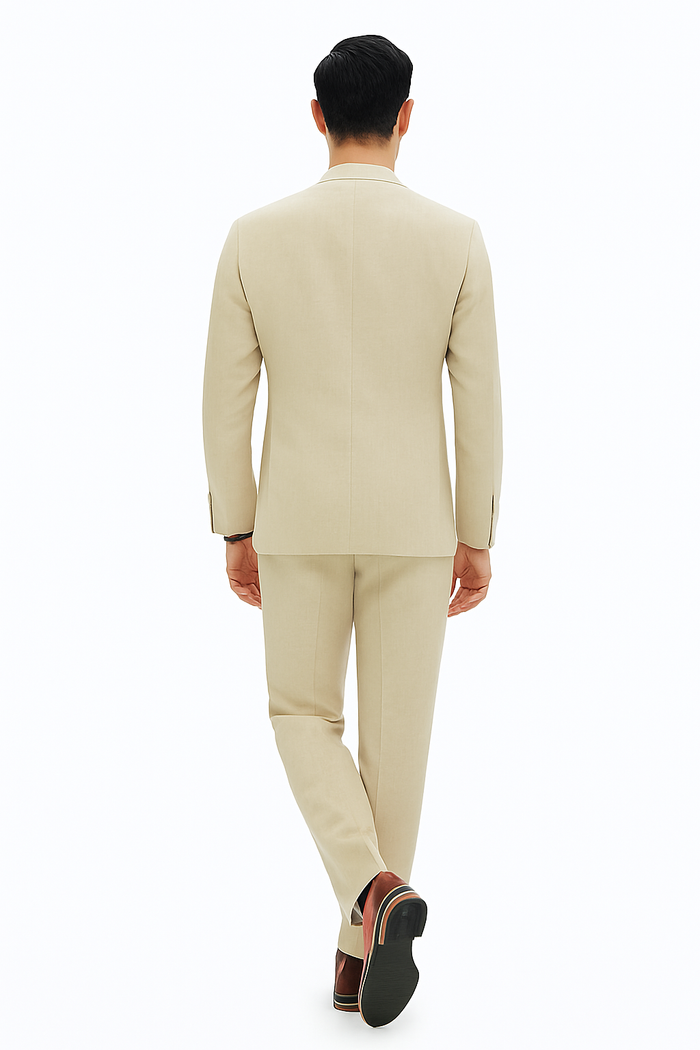 Men's light beige linen two-piece suit. Relaxed hybrid fit, no collar. Includes tailored jacket with long sleeves and back seam, and straight-cut trousers. Lightweight, smooth linen for a comfortable feel.
