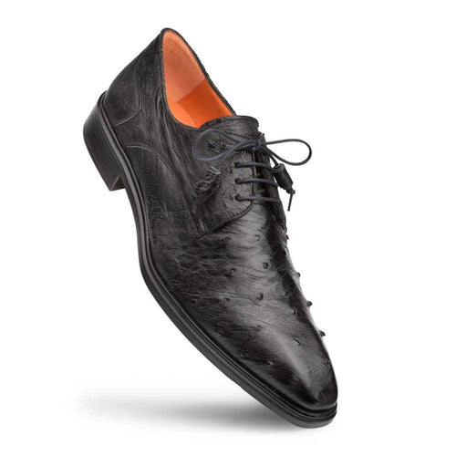 Mezlan's Tillson Black shoes: genuine ostrich leather bluchers. Pointed toe, textured black upper with natural patterns. Lace-up, orange interior, flat black sole for a sleek look.
