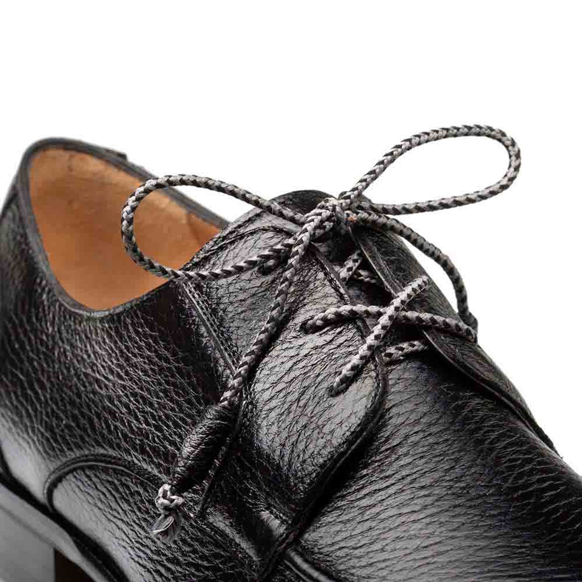 Fratello black deerskin split-toe lace-up shoes. Textured black leather upper with split toe. Round shape, traditional lace closure with braided laces. Tan interior lining. Sturdy sole with a slight heel.
