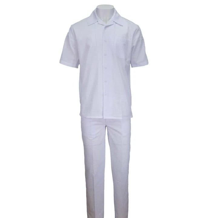White seersucker 2pc set: short-sleeved button-up shirt & straight-leg pants. Textured white fabric with seersucker pattern. Shirt features collar, relaxed fit. Coordinated look.