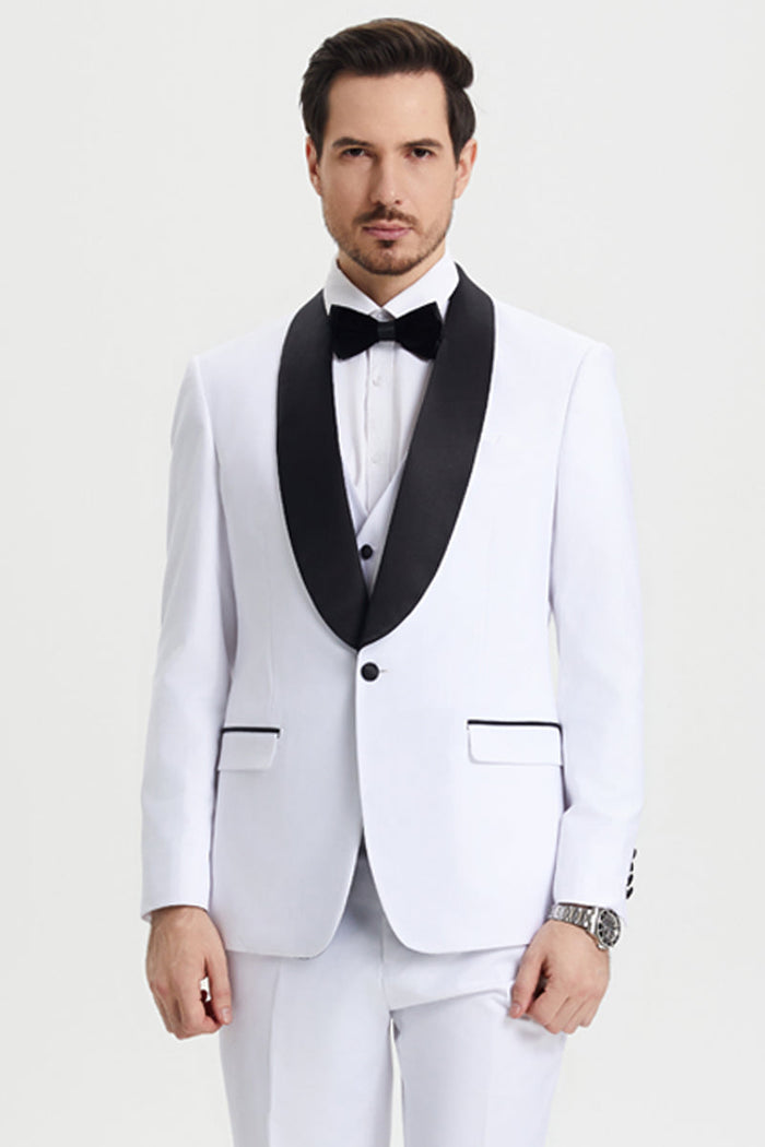 White Stacy Adams tuxedo with black satin shawl lapel, single button, and matching vest. Features two front pockets with black trim and white trousers.
