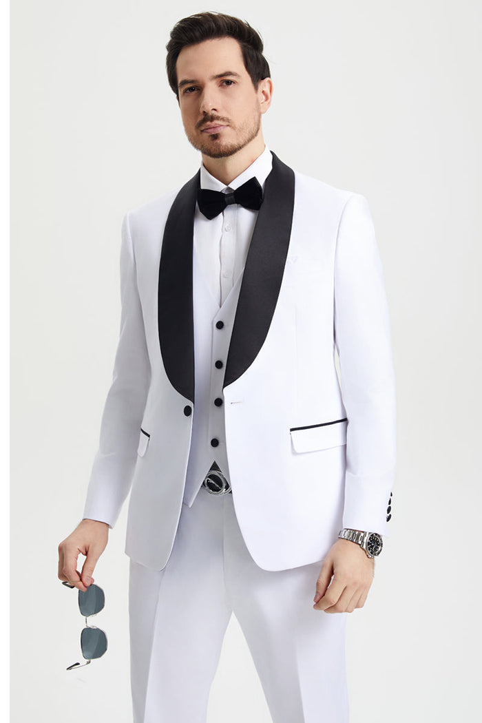 White Stacy Adams one-button tuxedo with shawl lapel and black trim. Tailored fit, includes matching vest and pants. Classic formal wear.
