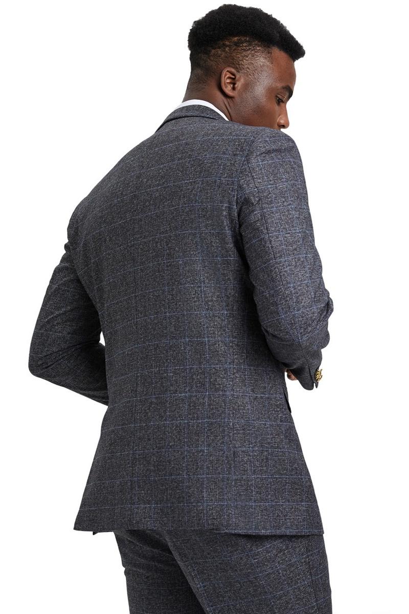 Charcoal grey windowpane plaid Stacy Adams suit for men. Double-breasted vest, structured shoulders, and defined lines. Woven textile with a fine texture.
