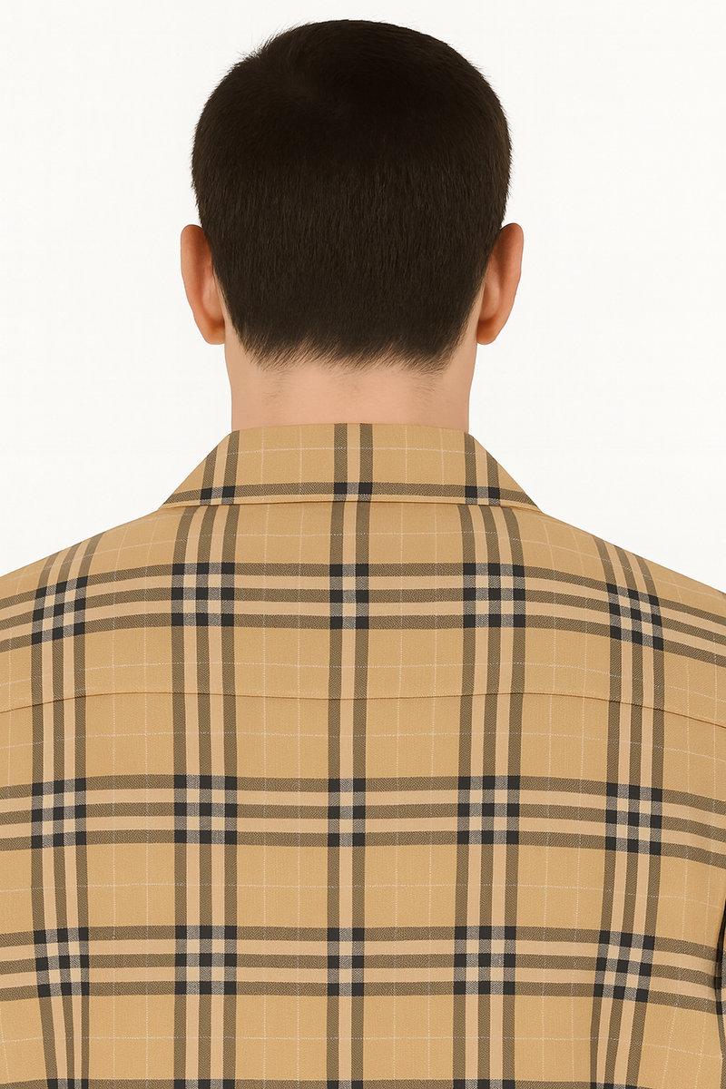 Beige plaid shirt with alternating light/dark brown stripes and black grid lines. Classic collar, straight-cut back.
