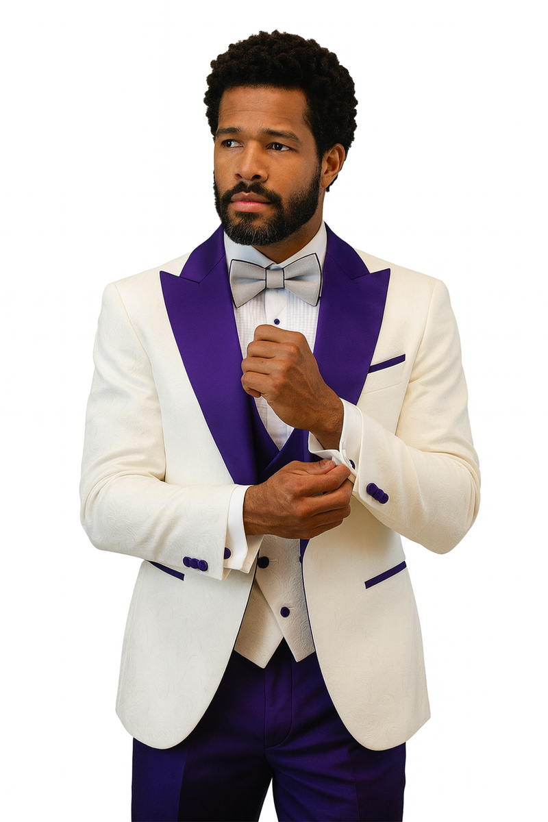 White tuxedo jacket with purple paisley lapel, matching shawl vest, and wool pants. Includes bow tie. Features contrasting purple button & trim details.
