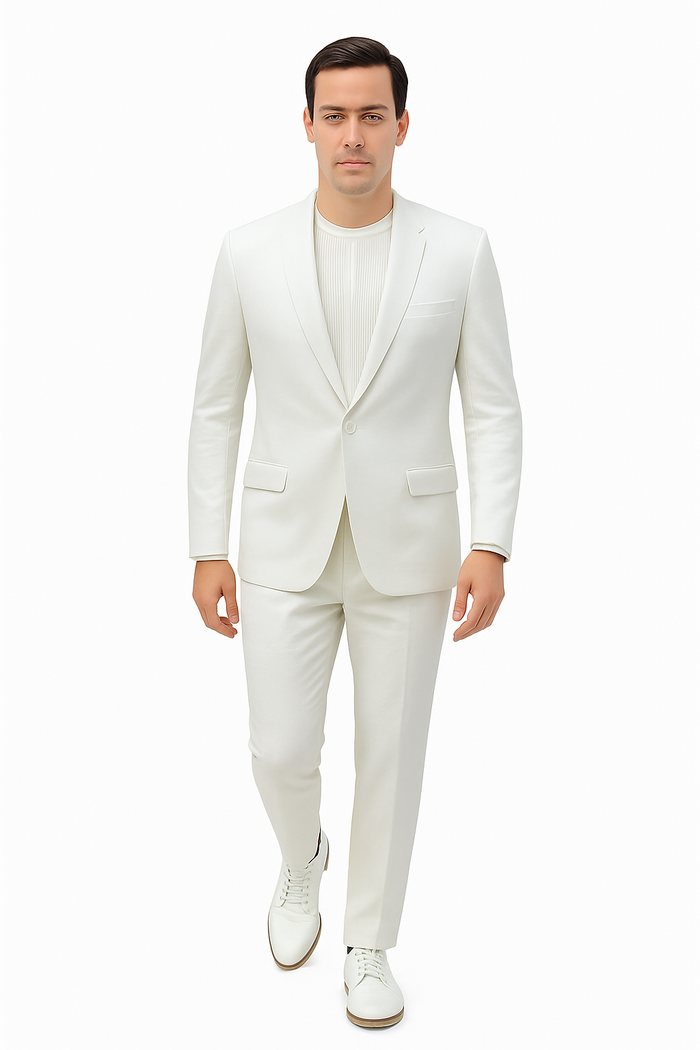 Men's linen suit: relaxed, collarless design. Light, white fabric. Includes a tailored jacket with two front pockets and matching streamlined trousers. Hybrid fit for comfort and style.
