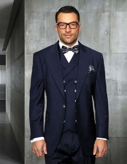 Formal dark navy wide-leg pants crafted from 100% wool. Featuring a pleated front, tailored silhouette, and smooth texture with subtle sheen. Designed for a structured yet relaxed fit.