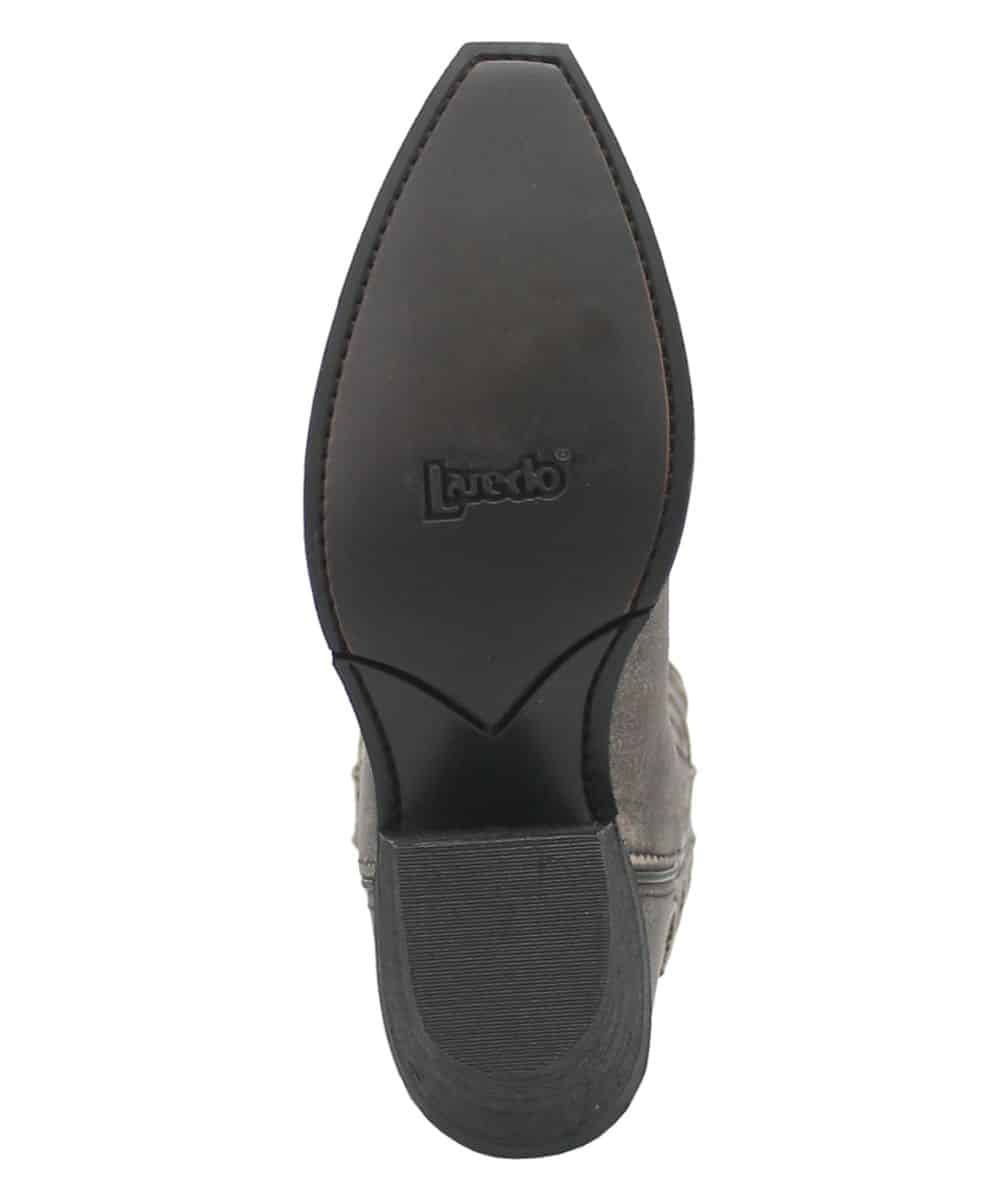 Laredo women's black Reva boot. Slim, pointed toe, flat rubber outsole. Soft black upper with subtle stitching. Slightly elevated heel, no visible patterns.
