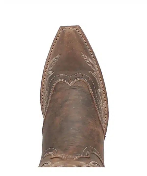 Laredo Zuri boot: Pointed toe, brown leather, decorative stitching, and intricate raised patterns. Subtle color variations enhance texture and design contours.
