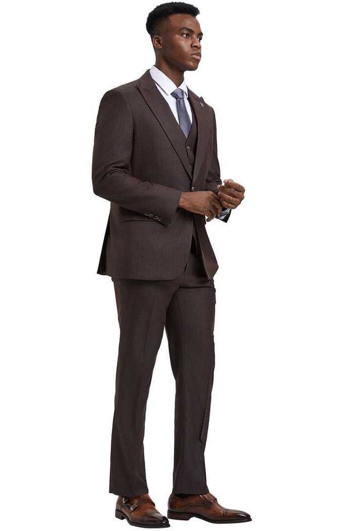 Stacy Adams men's one-button suit in brown windowpane plaid. Wide peak lapel, tailored jacket, fitted vest, and matching trousers. Subtle sheen enhances the structured look.
