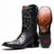 Marco Di Milano Alabama cowboy boots. Black ostrich quill leather upper, square toe, and decorative stitching. Red lining, leather sole, and patterned rubber outsole with branding.
