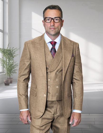 Statement men's 3-piece suit features a modern fit with a peak lapel design. The suit is made of 100% wool in a light brown color. It consists of a fitted jacket, a double-breasted vest with buttons, and matching trousers, showcasing a cohesive look.