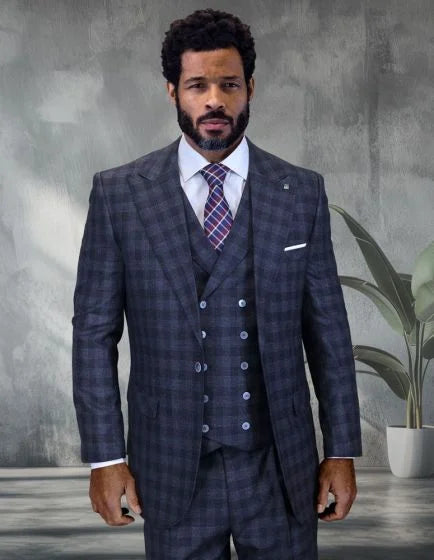 The Statement mens 3 piece big and tall suit features a dark plaid pattern with shades of gray and navy. It consists of a tailored jacket with a notched lapel, a double-breasted vest with four buttons, and matching trousers. The fabric appears to be a blend suitable for formal wear.