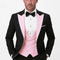 Black and pink tuxedo: double-breasted vest, peak lapel, 100% wool. Jacket with pink lapels, black body. A classic and bold design.
