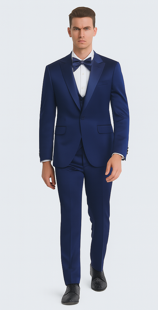 Blue satin, slim fit, three-piece suit with peak lapel. Includes a white shirt & bow tie. Features a smooth texture & structured form.

