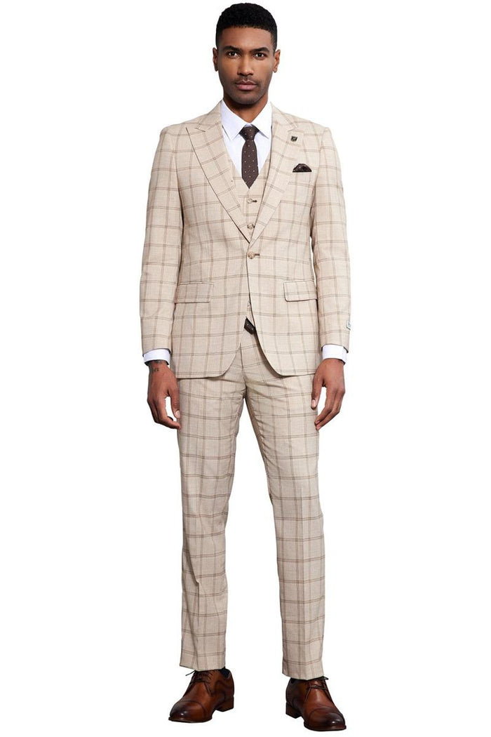 Men's Stacy Adams tan windowpane plaid suit. Fitted, one-button, peak lapel design. Includes matching vest. Slim-fit trousers. Smooth fabric for a structured look.
