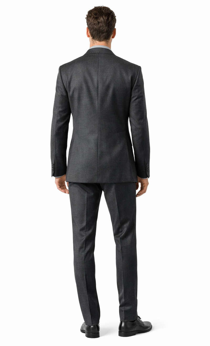 Albertonardoni's Carlo Lusso charcoal suit: slim fit, two-button jacket with structured shoulders and vent. Matching slim-fit pants. Smooth charcoal color with subtle texture. Tailored silhouette.
