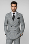 Black & white plaid suit. Double-breasted 100% wool jacket paired with baggy, pleated wide-leg pants. Classic plaid pattern throughout.