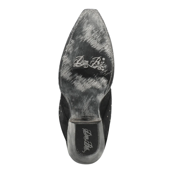 Black leather snip toe boot, bottom view. Pointed toe, flat sole, and wear markings are visible. A logo is inscribed on the surface.

