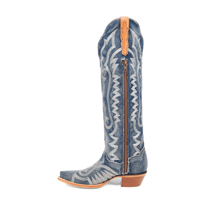 Dan Post Denim Darlin tall boots. Knee-high blue denim with white embroidery. Snip toe, back zipper, and tan leather top patch. Durable stacked heel.
